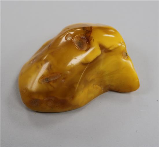 A free form piece of raw amber, gross weight 99 grams, 80mm.